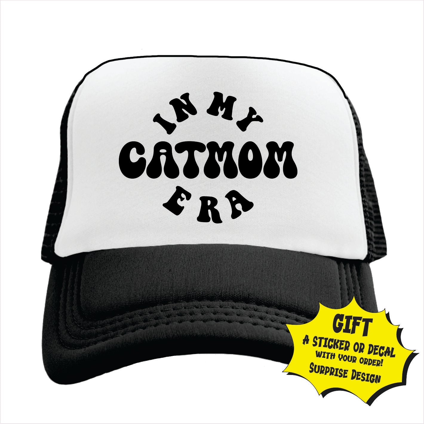 Black and white trucker hat cap with 'IN MY CATMOM ERA' printed in black text on the front panel.