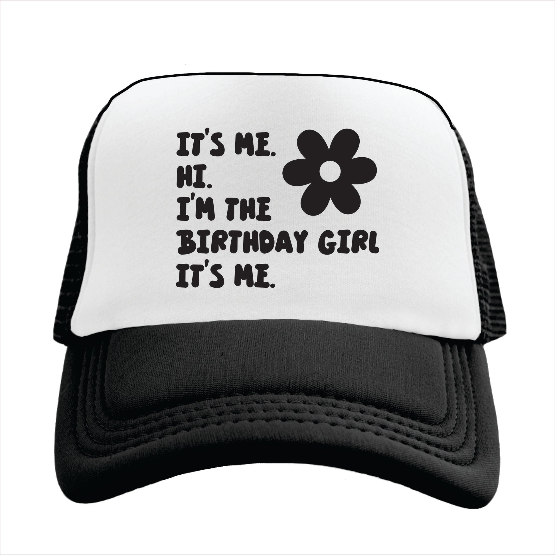 Black and white trucker hat cap with text 'IT'S ME. HI. I'M THE BIRTHDAY GIRL IT'S ME.' printed on the front.