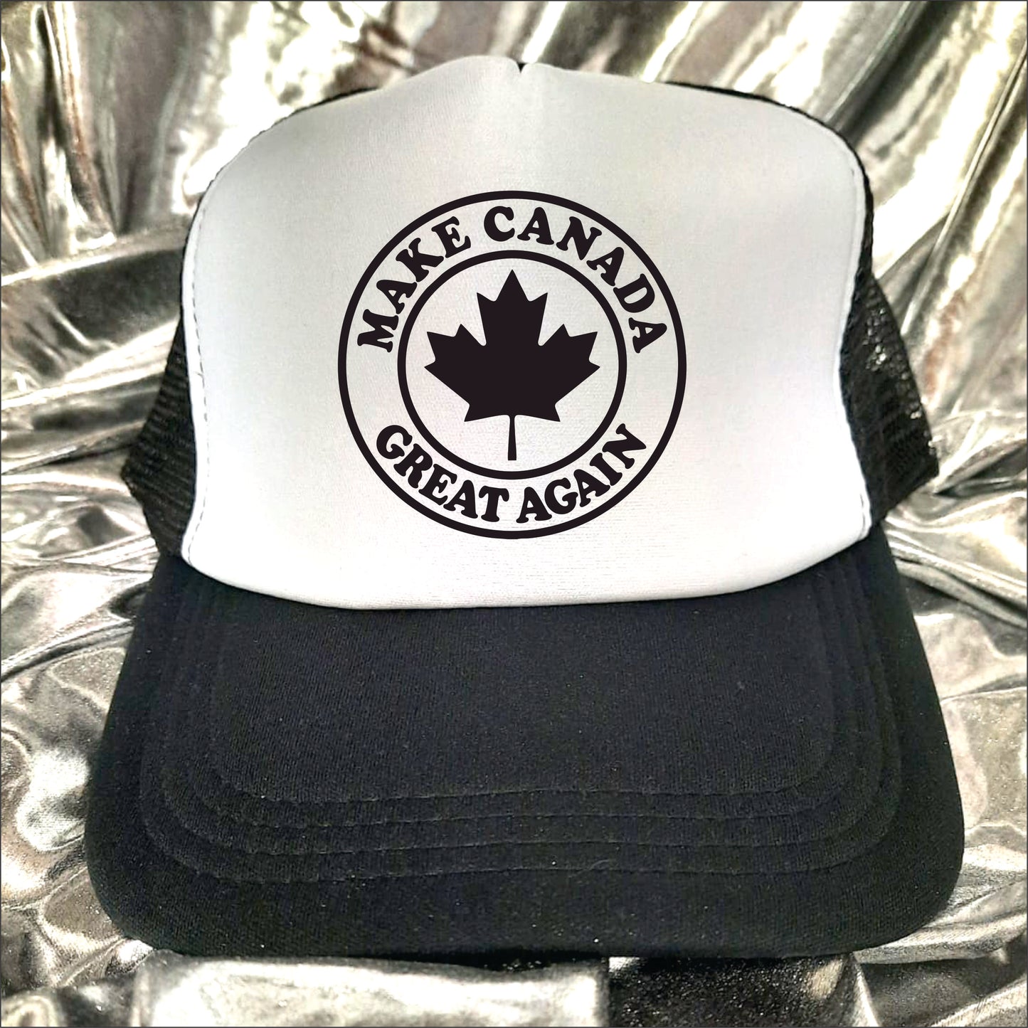 Black and white trucker hat cap with the text 'Make Canada great again'.