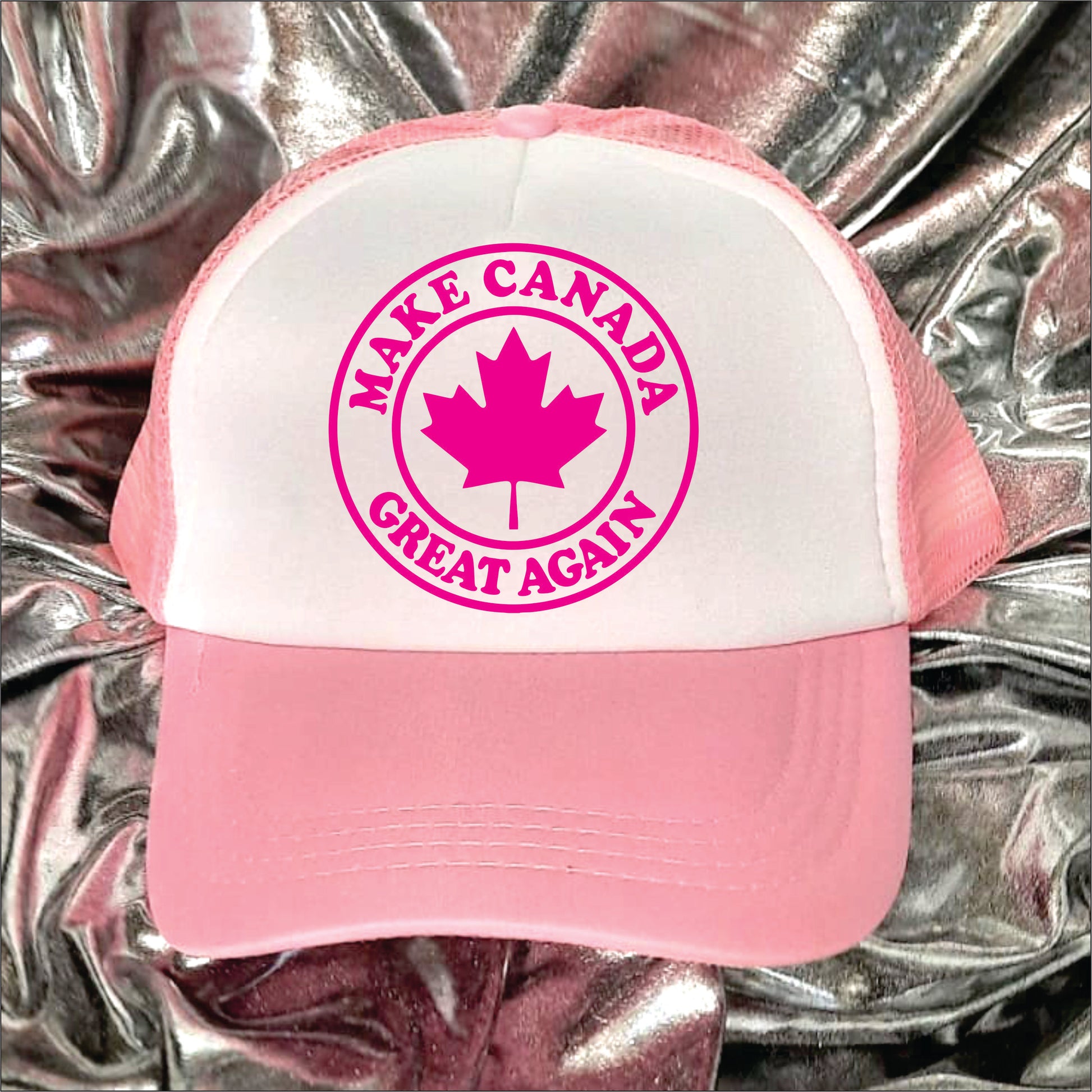 Light pink and white trucker hat cap with the text 'Make Canada great again'.