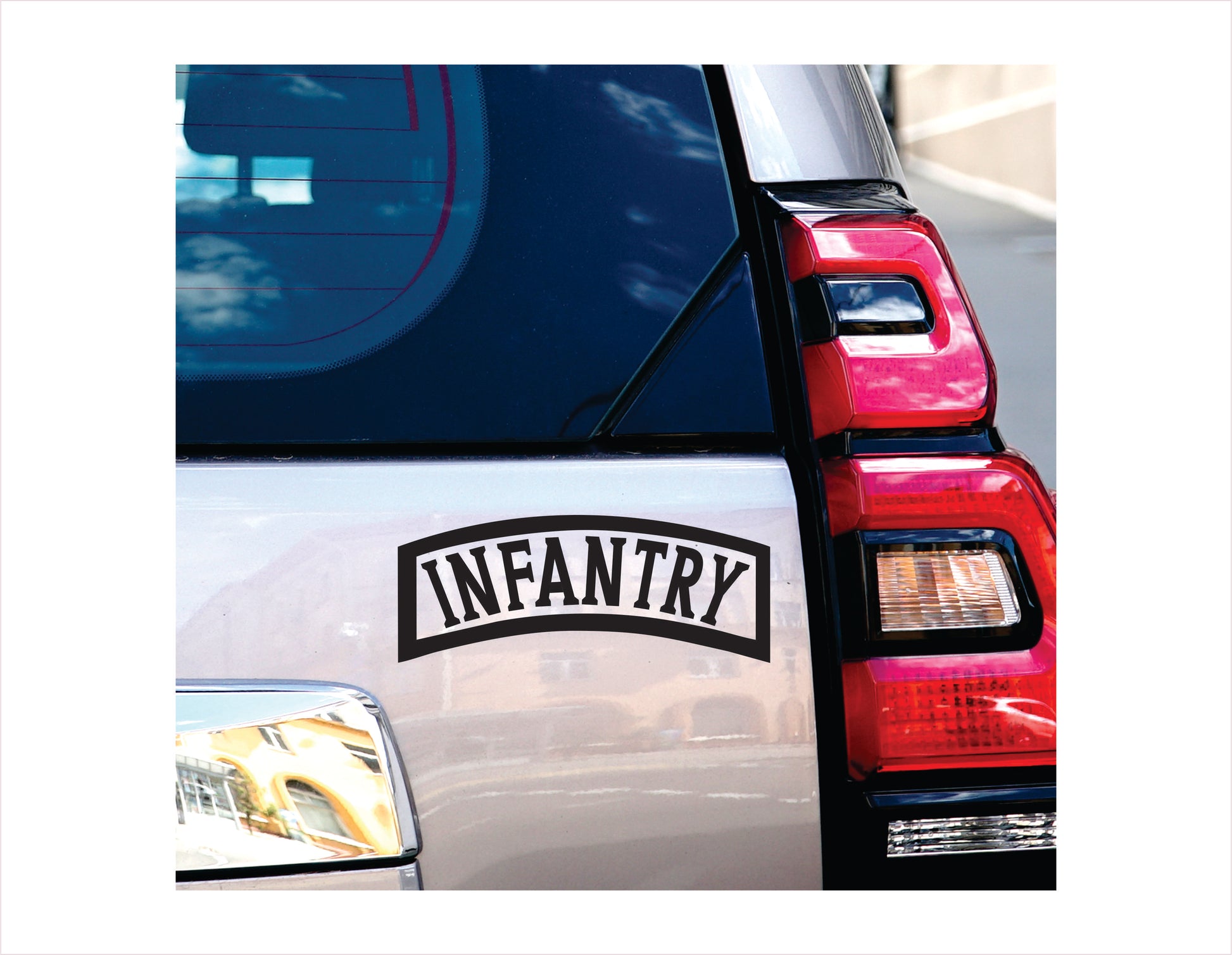 Car with 'INFANTRY' decal on the back