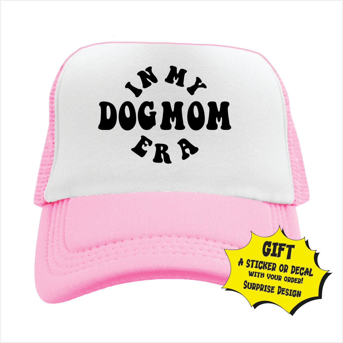 Light pink and white trucker hat cap with white text 'IN MY DOG MOM ERA' printed on the front.