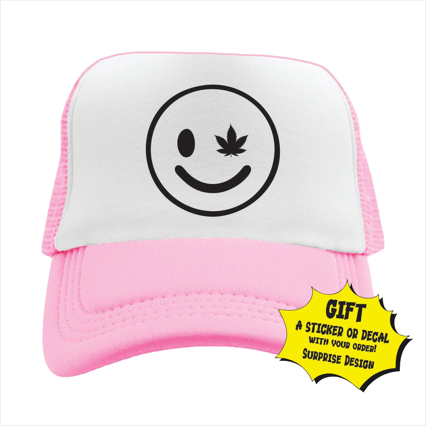 Light pink and white trucker hat cap with a black smiley face and a cannabis leaf design on the front.