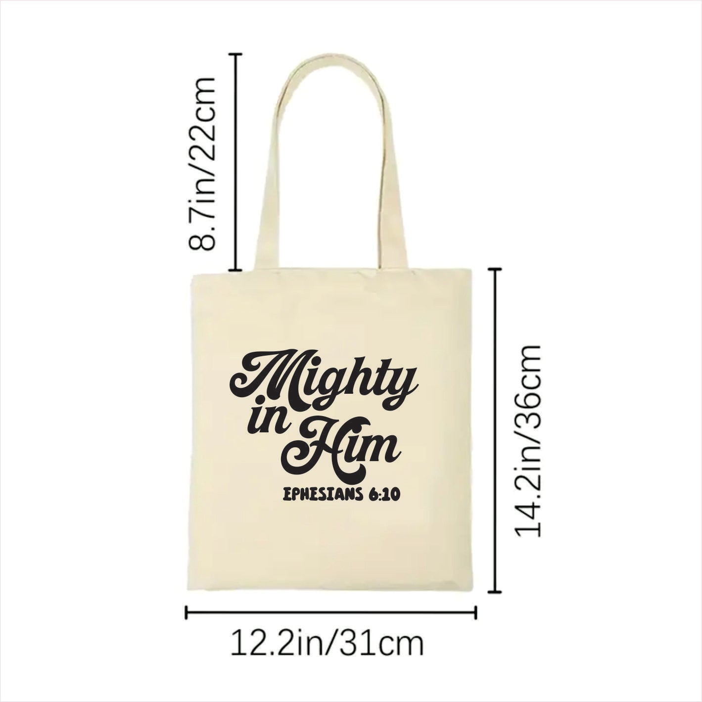 white tote bag with 'Mighty in Him' text and measurements on a white background