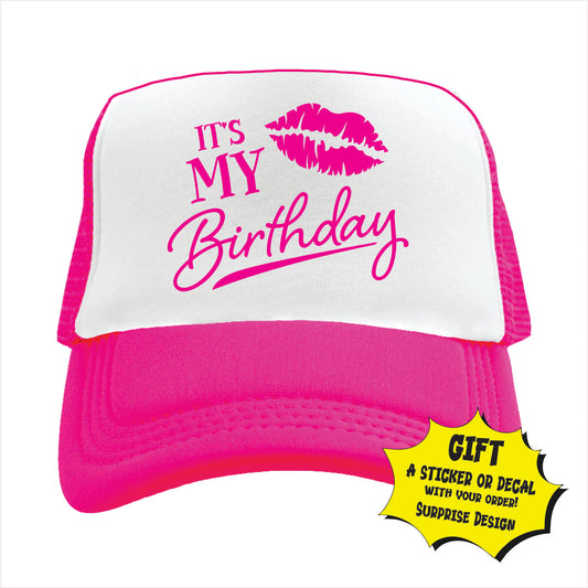 Pink and white trucker hat cap with 'It's My Birthday' text and a lips design on the front panel.