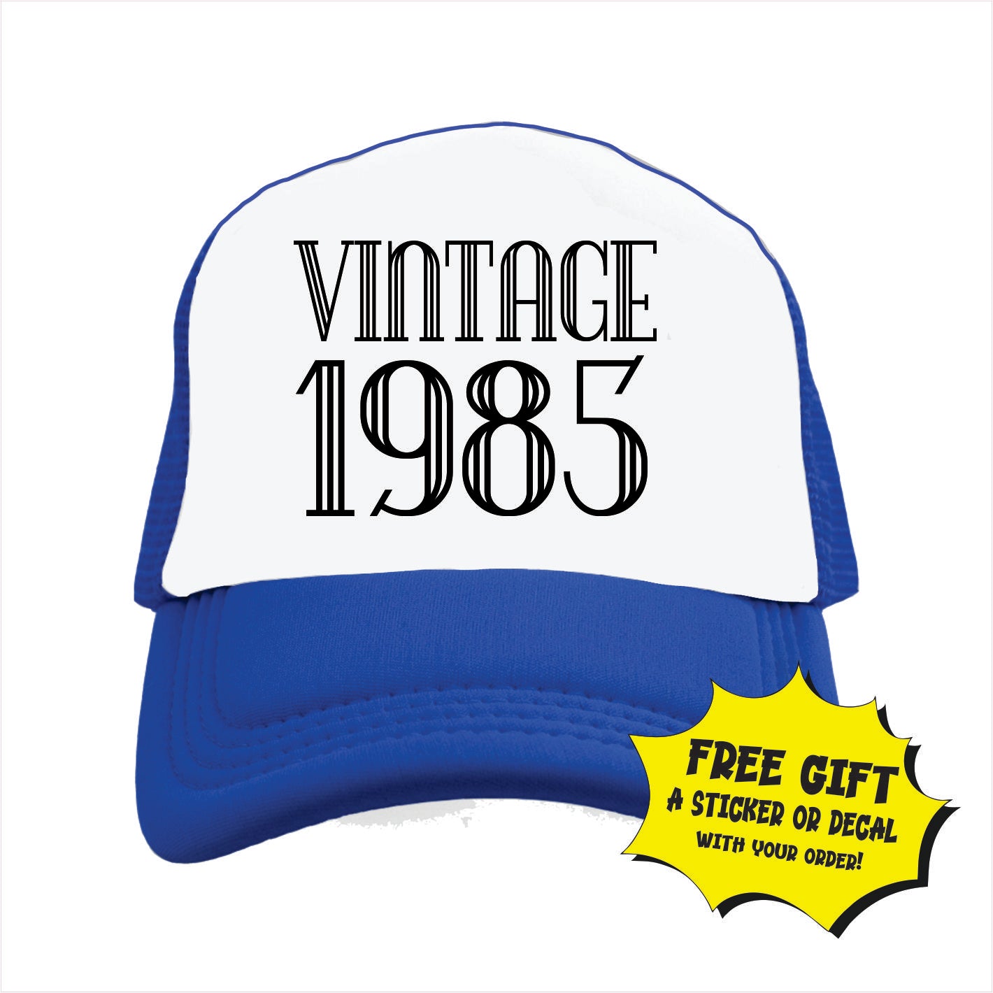 Blue and white trucker hat cap with 'VINTAGE 1985' printed in black text on the front panel.