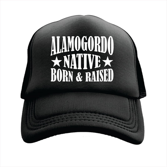 Black cap with 'Alamogordo Native Born & Raised' text on a white background