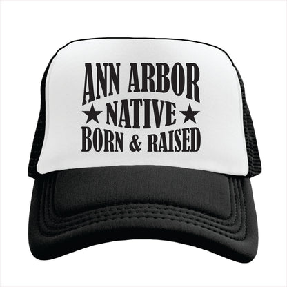 Trucker hat with 'Ann Arbor Native Born & Raised' text on a white background