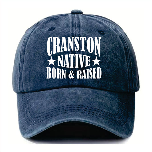 Blue cap with 'Cranston Native Born & Raised' text on a white background