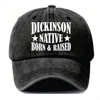 Black cap with 'Dickinson Native Born & Raised' text on a white background