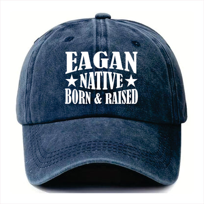 Blue cap with 'Eagan Native Born & Raised' text on a white background