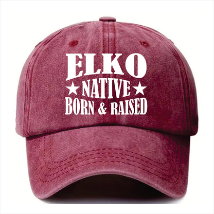 Burgundy cap with 'Elko Native Born & Raised' text on a white background