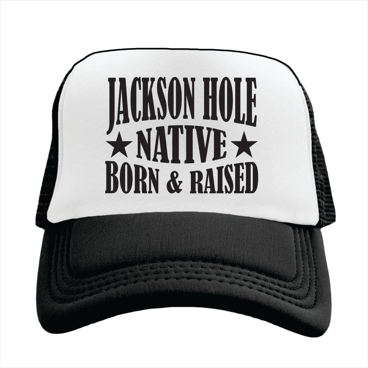 Black and white trucker hat with 'Jackson Hole Native Born & Raised' text on a white background