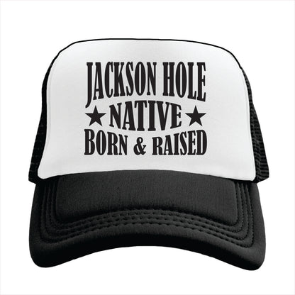 Black and white trucker hat with 'Jackson Hole Native Born & Raised' text on a white background