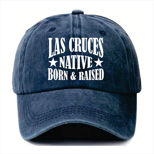 Blue cap with 'Las Cruces Native Born & Raised' text on a white background