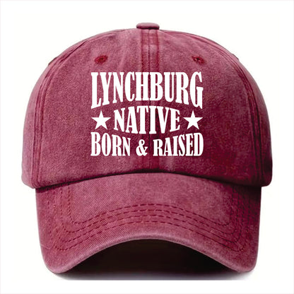 Burgundy cap with 'Lynchburg Native Born & Raised' text on a white background