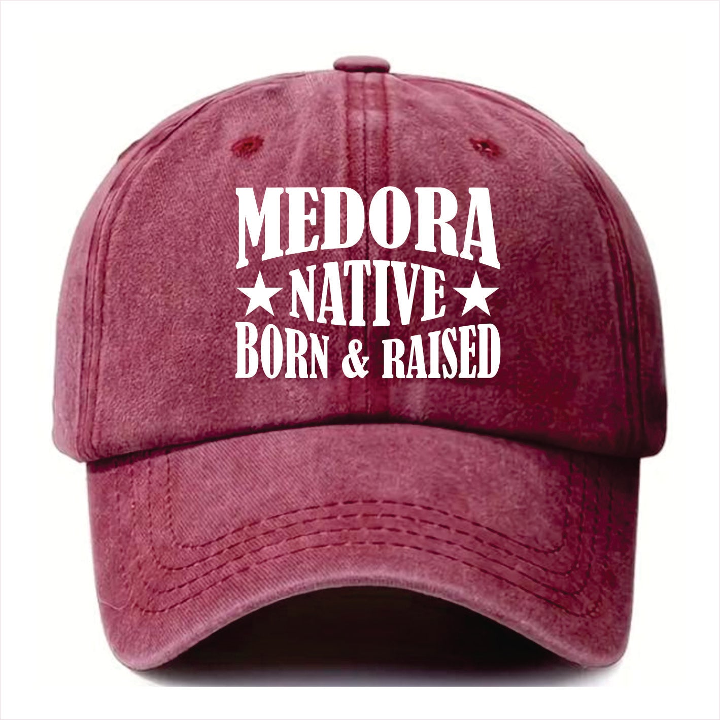 Burgundy cap with 'Medora Native Born & Raised' text on a white background