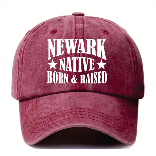 Burgundy cap with 'Newark Native Born & Raised' text on a white background