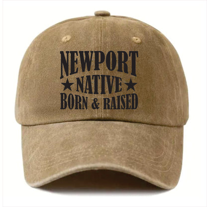 Khaki cap with 'Newport Native Born & Raised' text on a white background