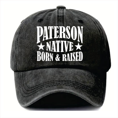 Black cap with 'Paterson Native Born & Raised' text on a white background