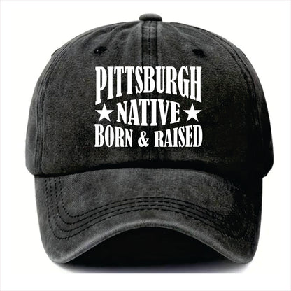 Black cap with 'Pittsburgh Native Born & Raised' text on a white background