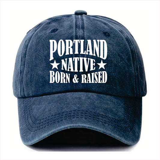 Blue cap with 'Portland Native Born & Raised' text on a white background