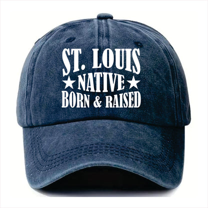 Blue cap with 'St. Louis Native Born & Raised' text on a white background