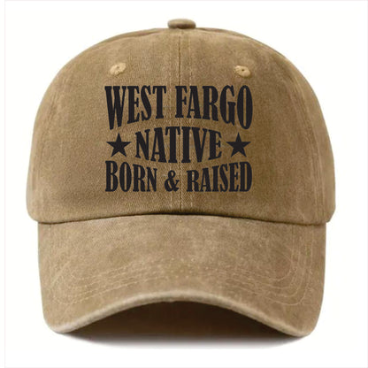Khaki cap with 'West Fargo Native Born & Raised' text on a white background