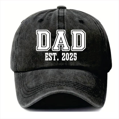 Black cap with 'DAD EST. 2025' text on a white background