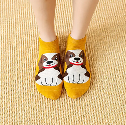 a girl wearing one pair of the pack of 5 women ankle socks with different cute dog designs