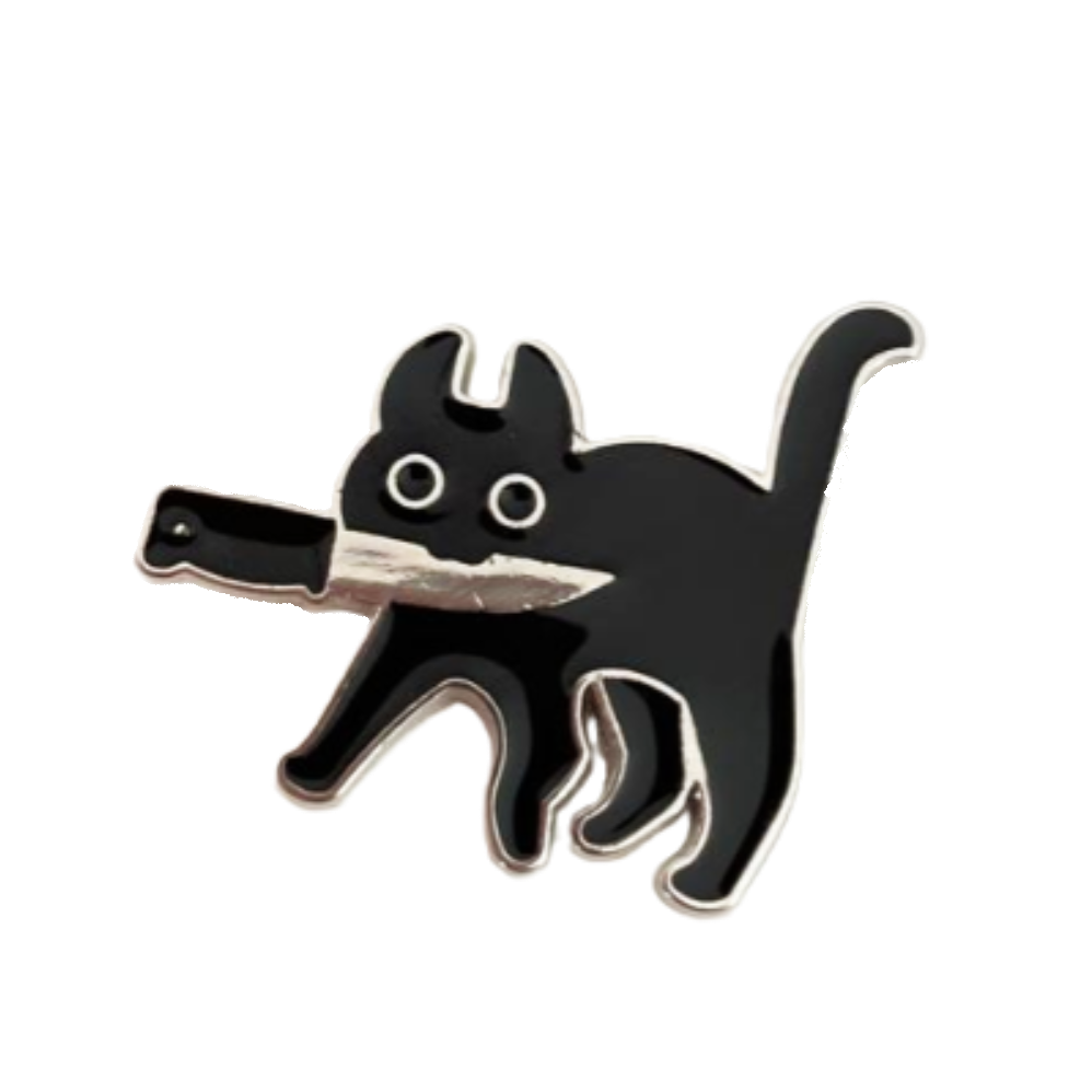 enamel pin with a black cat carrying a knife