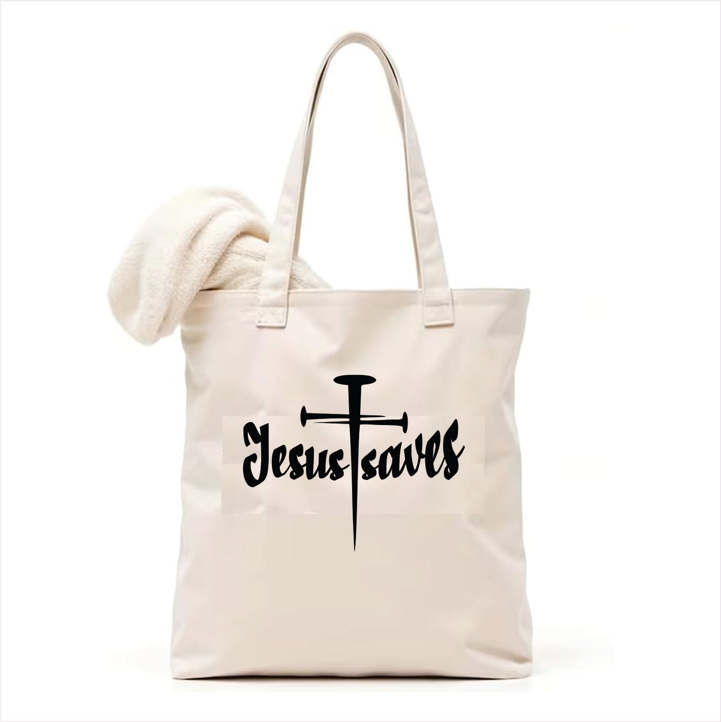 white tote bag with 'Jesus saves' text and cross design on a white background