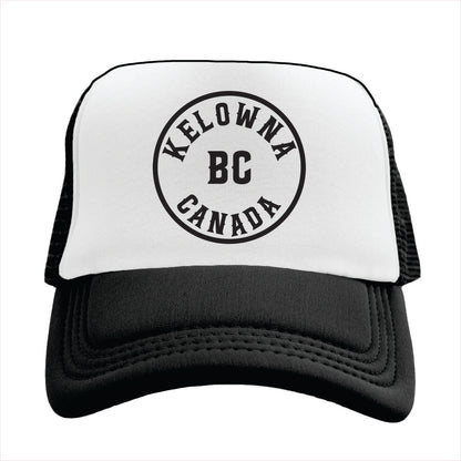 Trucker hat with 'Kelowna BC Canada' text on a white background