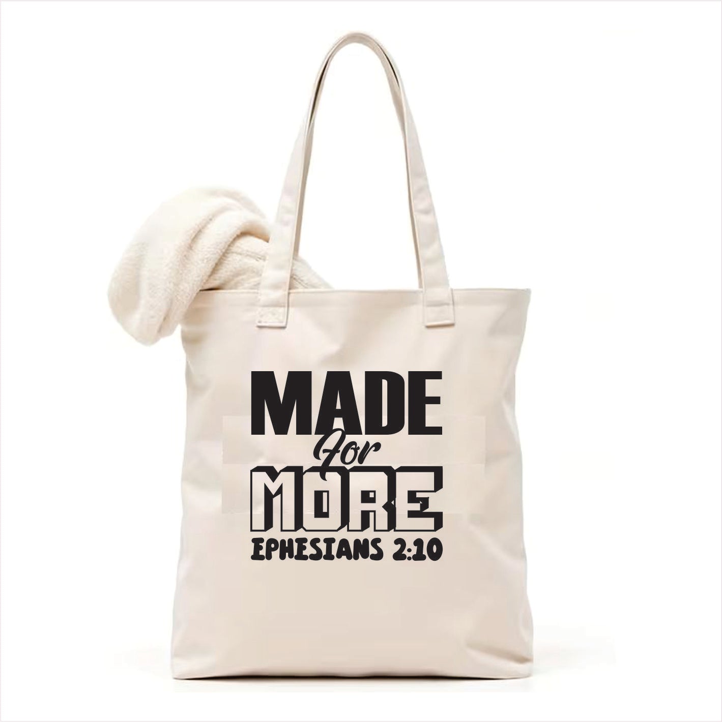 white tote bag with 'Made for More Ephesians 2:10' text on a white background