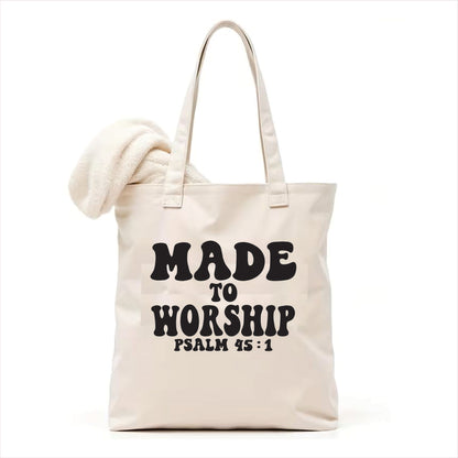 white tote bag with 'Made to Worship Psalm 45:1' text on a white background