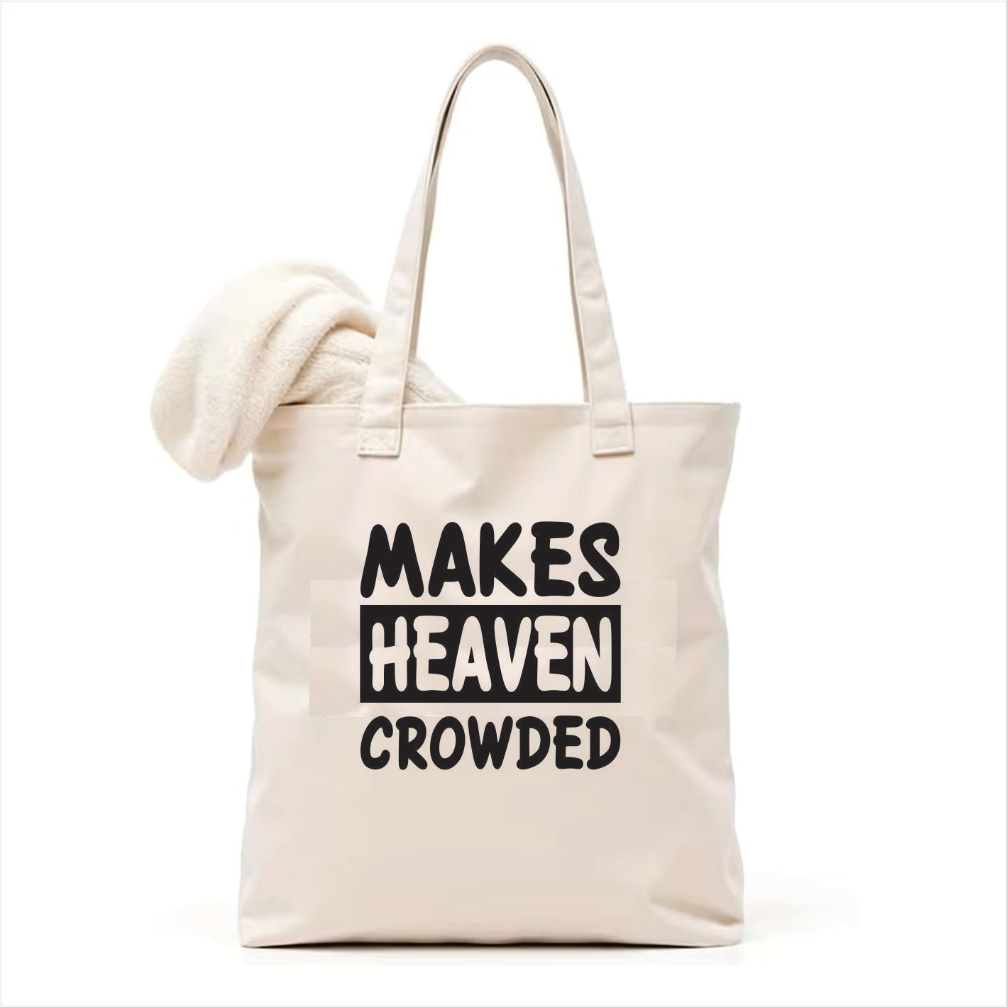 white tote bag with text 'MAKES HEAVEN CROWDED' on a white background