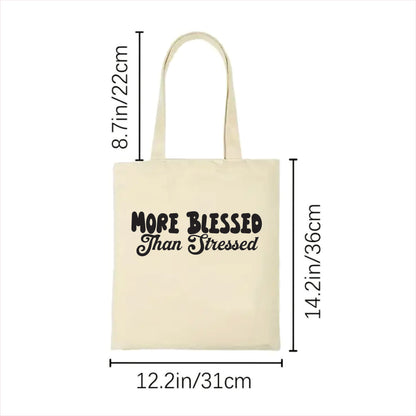 white tote bag with 'More Blessed Than Stressed' text and measurements on a white background