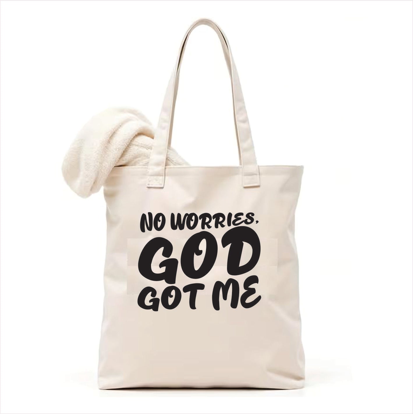 white tote bag with 'No worries, God got me' text on a white background