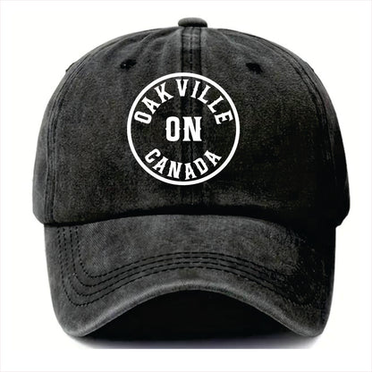 Black cap with 'Oakville ON Canada' text on a white background