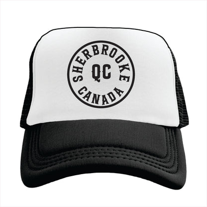 Trucker hat with 'Sherbrooke Canada QC' text on a white background