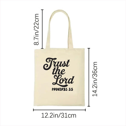 white tote bag with 'Trust the Lord Proverbs 3:5' text and measurements on a white background