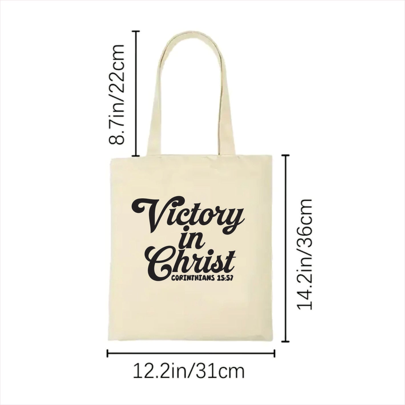 white tote bag with 'Victory in Christ' text and measurements on a white background