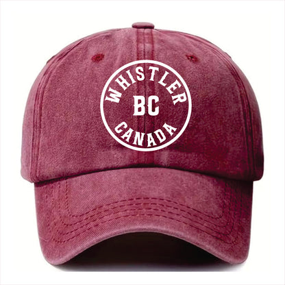 Purple cap with 'Whistler BC Canada' text on a white background