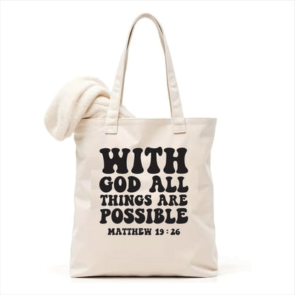 white tote bag with 'With God All Things Are Possible' text on a white background